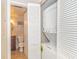 Convenient laundry closet with stackable washer and dryer located off the bathroom at 501 Maison Dr. # F8, Myrtle Beach, SC 29572