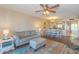 Cozy living room and dining area with warm, inviting decor and an open layout at 501 Maison Dr. # F8, Myrtle Beach, SC 29572