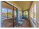 Charming porch with comfortable seating and scenic view of a lake at 501 Maison Dr. # F8, Myrtle Beach, SC 29572