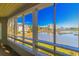 Relaxing porch view of the marsh and distant buildings at 501 Maison Dr. # F8, Myrtle Beach, SC 29572