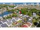 Scenic aerial view of a coastal community featuring a pond and well-maintained homes at 527 Bay Drive Ext., Garden City Beach, SC 29576