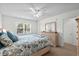 This bedroom features ample natural light, coastal decor and plush carpeting at 527 Bay Drive Ext., Garden City Beach, SC 29576