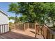 Wooden deck with railings offering views of the surrounding green landscape at 527 Bay Drive Ext., Garden City Beach, SC 29576