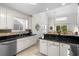 Open kitchen and breakfast nook area with breakfast bar and easy access to rear deck at 527 Bay Drive Ext., Garden City Beach, SC 29576