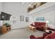 Bright living room featuring vaulted ceilings, a comfortable seating area, and ample natural light at 527 Bay Drive Ext., Garden City Beach, SC 29576
