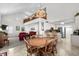 Open-concept layout connecting the dining area, kitchen, and living room, perfect for entertaining at 527 Bay Drive Ext., Garden City Beach, SC 29576