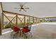 Spacious covered patio with dining area, offering a relaxing outdoor space at 527 Bay Drive Ext., Garden City Beach, SC 29576