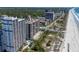 Aerial view of the condominium complex, highlighting oceanfront location and pools at 5308 N Ocean Blvd. # 504, Myrtle Beach, SC 29577