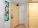 Condo entryway features a stained glass window detail and tiled floor at 5308 N Ocean Blvd. # 504, Myrtle Beach, SC 29577