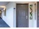 Exterior view of the unit's front door with stained glass window detail and unit number at 5308 N Ocean Blvd. # 504, Myrtle Beach, SC 29577