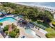 Beautiful pools surrounded by lush landscaping, lounge chairs, and sunny beach views at 5308 N Ocean Blvd. # 504, Myrtle Beach, SC 29577