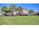 Spacious backyard with a stone patio, outdoor seating, dining and grilling areas at 5809 Oakbury Ct., Myrtle Beach, SC 29579
