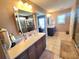 Spacious bathroom with a double vanity, ample counter space, and a walk-in shower at 5809 Oakbury Ct., Myrtle Beach, SC 29579