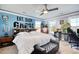 Well-lit bedroom with an eat, sleep, game theme and bench at 5809 Oakbury Ct., Myrtle Beach, SC 29579