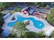 Aerial view of a community pool, recreational area, playground and gathering spaces at 5809 Oakbury Ct., Myrtle Beach, SC 29579