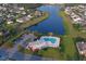 Aerial view of a community pool, clubhouse, playground, parking and surrounding residential neighborhood at 5809 Oakbury Ct., Myrtle Beach, SC 29579