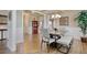 Elegant dining room featuring a wooden table with seating and stylish decor at 5809 Oakbury Ct., Myrtle Beach, SC 29579
