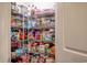 Well-stocked walk-in pantry offers ample storage with wire shelving for food and household items at 5809 Oakbury Ct., Myrtle Beach, SC 29579