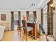 Charming bar area features dark wood accents, natural lighting, and comfortable barstool seating at 5916 Falcon Landing Circle, North Myrtle Beach, SC 29582