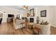 Spacious living room featuring a fireplace, neutral colored walls and hardwood floors at 5916 Falcon Landing Circle, North Myrtle Beach, SC 29582