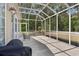 Relaxing screened porch with ample seating, offering a tranquil outdoor space for leisure at 5916 Falcon Landing Circle, North Myrtle Beach, SC 29582