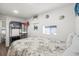 A cozy bedroom features wood floors, aquatic décor, and a small window for natural light at 6001- 5718 S Kings Highway, Myrtle Beach, SC 29575