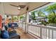 Relaxing covered front porch with comfortable seating and views of the neighborhood at 6001- 5718 S Kings Highway, Myrtle Beach, SC 29575