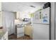 A functional kitchen features white appliances, a microwave, and countertops with available storage at 6001- 5718 S Kings Highway, Myrtle Beach, SC 29575
