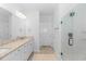 Elegant bathroom with double vanity and glass-enclosed shower at 6076 Campanella St., Myrtle Beach, SC 29577