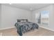 Comfortable bedroom featuring great natural light, a bed, and wood floors at 6076 Campanella St., Myrtle Beach, SC 29577