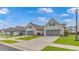 Inviting row of homes each with a two-car garage and manicured lawns at 6076 Campanella St., Myrtle Beach, SC 29577