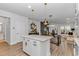 Stylishly designed open concept with kitchen island, dining area, and comfortable living space at 6076 Campanella St., Myrtle Beach, SC 29577