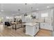Spacious open concept showcasing the kitchen, dining, and living areas with abundant natural light at 6076 Campanella St., Myrtle Beach, SC 29577