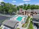Aerial view of community pool offers a refreshing escape with comfortable lounge chairs at 613 13Th Ave. S # 147, Surfside Beach, SC 29575