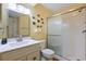Bathroom featuring tile floors, a vanity and a shower behind sliding glass doors at 613 13Th Ave. S # 147, Surfside Beach, SC 29575