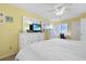 Bright bedroom featuring neutral decor, a ceiling fan and a television for relaxing after a long day at 613 13Th Ave. S # 147, Surfside Beach, SC 29575