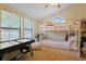 Bedroom with vaulted ceiling, bunk beds, an air hockey table and plenty of natural light at 613 13Th Ave. S # 147, Surfside Beach, SC 29575
