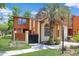 Charming two-story home with gated front courtyard and mature palm tree at 613 13Th Ave. S # 147, Surfside Beach, SC 29575