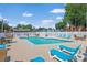 Inviting community pool area with ample seating for residents and guests at 613 13Th Ave. S # 147, Surfside Beach, SC 29575