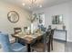 Elegant dining room with modern lighting and stylish decor, perfect for entertaining at 615 Fair Feather Ct., Myrtle Beach, SC 29588