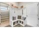 Organized mudroom features built-in bench with storage, hooks, and decor; blends function with stylish design at 615 Fair Feather Ct., Myrtle Beach, SC 29588