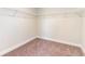 Empty walk-in closet with wire shelving and neutral carpeting in a home for sale at 615 Fair Feather Ct., Myrtle Beach, SC 29588