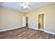 Spacious bedroom featuring hardwood floors and easy access to an ensuite bathroom at 6172 Catalina Dr. # 214, North Myrtle Beach, SC 29582