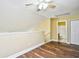 Bonus Room with high ceilings, wood-look flooring, and stairs to another level at 6172 Catalina Dr. # 214, North Myrtle Beach, SC 29582