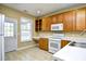 Well-lit kitchen with ample counter space and cabinets, perfect for cooking and storage at 6172 Catalina Dr. # 214, North Myrtle Beach, SC 29582