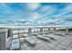 Oceanfront patio with lounge chairs overlooking the beach at 6172 Catalina Dr. # 214, North Myrtle Beach, SC 29582