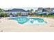 Community pool with lounge chairs and umbrellas, perfect for relaxation and summer fun at 6172 Catalina Dr. # 214, North Myrtle Beach, SC 29582