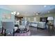 Open-concept design showcasing the dining area, kitchen, and living space with ample natural light at 639 Fair Feather Ct., Myrtle Beach, SC 29588