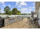 Outdoor kitchen features a built-in grill and seating area, perfect for entertaining at 649 W Perry Rd., Myrtle Beach, SC 29579
