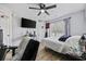 Comfortable bedroom with a TV and window that allows plenty of natural light at 649 W Perry Rd., Myrtle Beach, SC 29579